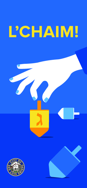 Blue banner with hand spinning a dreidel 